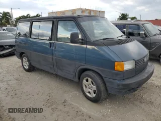 1993 Volkswagen EuroVan с VIN WV2MC0707PH010911, выставлен на аукционе Copart как лот 78414594 с пробегом 191 174 миль миль и Чистый • Clean title. История ставок и продаж доступна на DreamBid. Изображение 4.