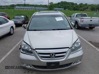 2007 Honda Odyssey Touring z VIN 5FNRL38877B091046, wystawiony jako IAAI lot #42187965 z przebiegiem Nie podano mil oraz . Historia ofert i sprzedaży dostępna na DreamBid. Obrazek 12.