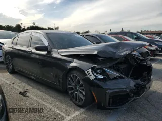 2021 BMW 7 Series 740i with VIN WBA7T2C01MCF51202, listed as a Copart auction lot 84522934 with Not provided miles and Salvage title. Bid and sale history available at DreamBid. Image 4.