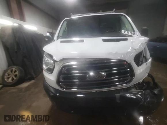 2018 Ford Transit z VIN 1FTYR1YM5JKA58794, wystawiony jako Copart lot #51187265 z przebiegiem 121 489 mil mil oraz Szkoda całkowita • Salvage title. Historia ofert i sprzedaży dostępna na DreamBid. Obrazek 14.