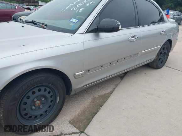2003 Kia Optima LX z VIN KNAGD128235248556, wystawiony jako IAAI lot #42366002 z przebiegiem 140 904 mil mil oraz . Historia ofert i sprzedaży dostępna na DreamBid. Obrazek 6.