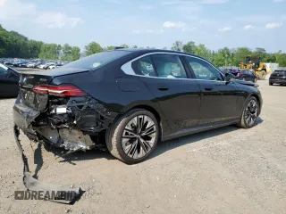 2024 BMW 5 Series 530i xDrive with VIN WBA53FJ04RCP87607, listed as a Copart auction lot 58768065 with 11,596 mi miles and Salvage title. Bid and sale history available at DreamBid. Image 3.