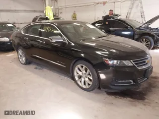 2015 Chevrolet Impala LTZ with VIN 2G1165S38F9145916, listed as a IAAI auction lot 41982242 with 303,316 mi miles. Bid and sale history available at carsss.com. Image 1.