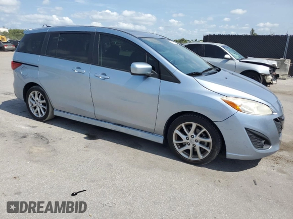 2012 Mazda 5 Touring with VIN JM1CW2CL0C0104148, listed as a Copart auction lot 61018845 with 147,222 mi miles and Salvage title. Bid and sale history available at DreamBid. Image 4.