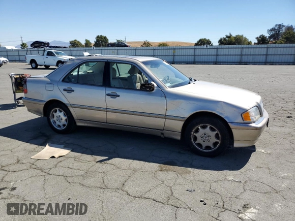 2000 Mercedes-Benz C 230 Kompressor with VIN WDBHA24G5YA826317, listed as a Copart auction lot 69146854 with 103,928 mi miles and Salvage Title. Bid and sale history available at carsss.com. Image 4.
