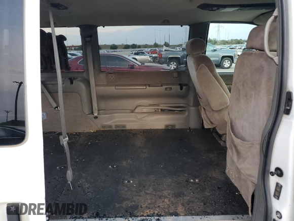 2003 GMC Safari z VIN 1GKDM19XX3B513779, wystawiony jako Copart lot #80021574 z przebiegiem 188 737 mil mil oraz Szkoda całkowita • Salvage title. Historia ofert i sprzedaży dostępna na DreamBid. Obrazek 11.