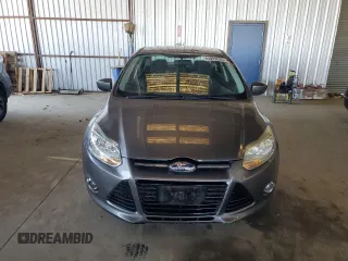 2012 Ford Focus SE with VIN 1FAHP3F28CL114572, listed as a Copart auction lot 63053035 with 142,994 mi miles and Salvage title. Bid and sale history available at DreamBid. Image 5.