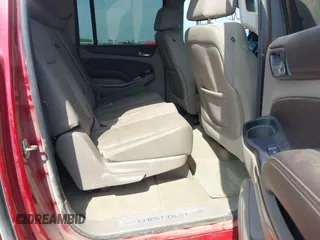 2015 Chevrolet Suburban LT with VIN 1GNSKJKC5FR726299, listed as a IAAI auction lot 42740904 with 96,700 mi miles and . Bid and sale history available at DreamBid. Image 8.