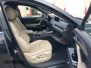 2022 Mazda CX-9 Grand Touring with VIN JM3TCBDYXN0627657, listed as a IAAI auction lot 42498856 with 61,044 mi miles and . Bid and sale history available at DreamBid. Image 5.