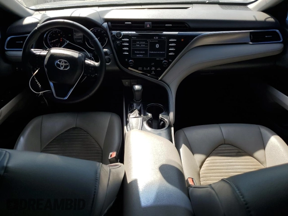 2018 Toyota Camry LE с VIN 4T1B11HKXJU656262, выставлен на аукционе Copart как лот 57132965 с пробегом 106 876 миль миль и Списание • Salvage title. История ставок и продаж доступна на DreamBid. Изображение 8.