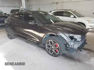 2021 Ford Mustang Mach-E GT z VIN 3FMTK4SE1MME00977, wystawiony jako IAAI lot #42184475 z przebiegiem 30 526 mil mil oraz . Historia ofert i sprzedaży dostępna na DreamBid. Obrazek 1.