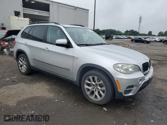 2012 BMW X5 35i with VIN 5UXZV4C57CL747717, listed as a Copart auction lot 63003135 with 135,999 mi miles and Clean title. Bid and sale history available at DreamBid. Image 4.