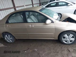 2009 Kia Spectra EX z VIN KNAFE221395647549, wystawiony jako IAAI lot #42408076 z przebiegiem 227 302 mil mil oraz . Historia ofert i sprzedaży dostępna na DreamBid. Obrazek 13.