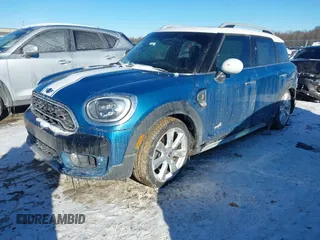 2018 MINI Countryman Cooper S with VIN WMZYT5C3XJ3E61612, listed as a IAAI auction lot 41276107 with 59,554 mi miles and . Bid and sale history available at DreamBid. Image 2.