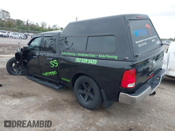 2014 Ram 1500 Tradesman with VIN 1C6RR7FT3ES345596, listed as a IAAI auction lot 41611084 with 101,496 mi miles. Bid and sale history available at carsss.com. Image 3.