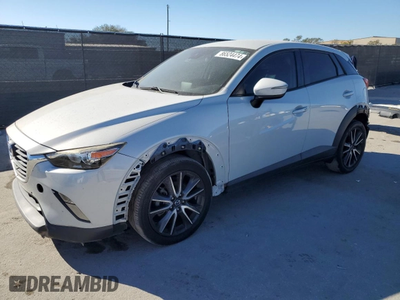 2018 Mazda CX-3 Touring with VIN JM1DKDC77J0305749, listed as a Copart auction lot 86524474 with 112,562 mi miles and Salvage Title. Bid and sale history available at DreamBid. Image 1.
