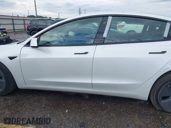 2023 Tesla Model 3 z VIN 5YJ3E1EA0PF511158, wystawiony jako IAAI lot #42210455 z przebiegiem 22 291 mil mil oraz . Historia ofert i sprzedaży dostępna na DreamBid. Obrazek 14.