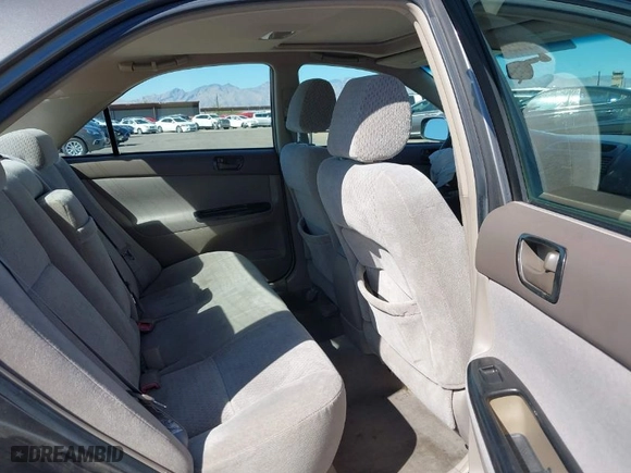 2004 Toyota Camry LE with VIN 4T1BF32K94U582052, listed as a IAAI auction lot 41850714 with 152,528 mi miles. Bid and sale history available at carsss.com. Image 8.