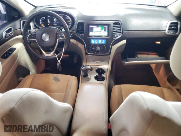 2014 Jeep Grand Cherokee Laredo with VIN 1C4RJFAG2EC132895, listed as a Copart auction lot 49311855 with 147,289 mi miles and Salvage Title. Bid and sale history available at DreamBid. Image 8.