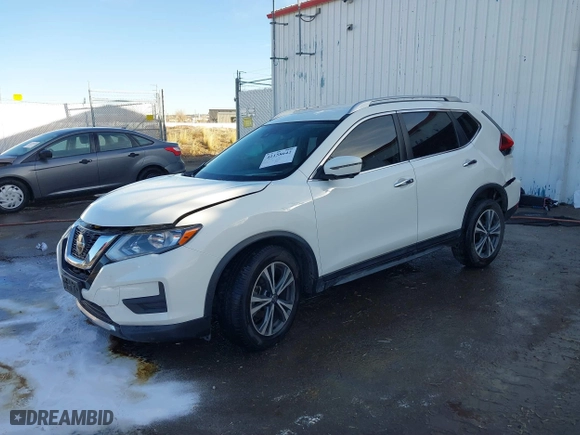 2020 Nissan Rogue SV with VIN JN8AT2MV9LW138882, listed as a IAAI auction lot 41158642 with 102,359 mi miles. Bid and sale history available at carsss.com. Image 2.