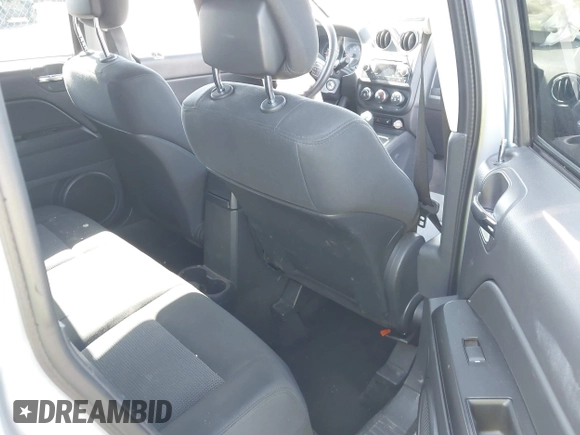 2013 Jeep Compass Latitude with VIN 1C4NJDEB2DD263920, listed as a IAAI auction lot 41832542 with 128,018 mi miles. Bid and sale history available at carsss.com. Image 8.