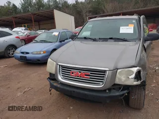 2008 GMC Envoy SLE1 with VIN 1GKDS13S682205759, listed as a IAAI auction lot 41378668 with 234,582 mi miles and . Bid and sale history available at DreamBid. Image 6.