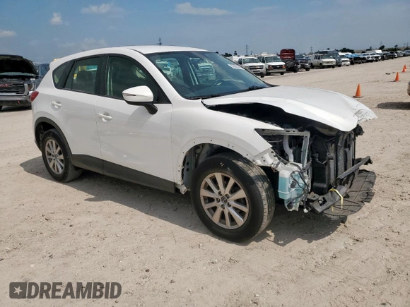 2016 Mazda CX-5 Sport with VIN JM3KE4BY0G0742436, listed as a Copart auction lot 59693945 with 74,314 mi miles and Salvage title. Bid and sale history available at DreamBid. Image 4.
