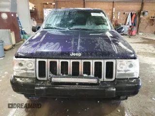 1997 Jeep Grand Cherokee Laredo with VIN 1J4GZ58Y7VC678708, listed as a Copart auction lot 87803725 with 312,585 mi miles and Salvage Title. Bid and sale history available at carsss.com. Image 5.