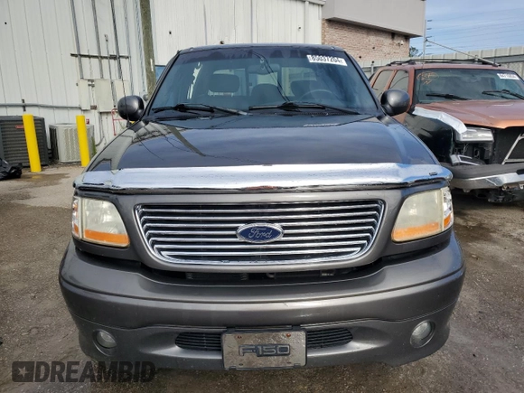 2002 Ford F-150 Harley Davidson with VIN 1FTRW07352KD72978, listed as a Copart auction lot 85037204 with 53,951 mi miles and Salvage Title. Bid and sale history available at carsss.com. Image 5.