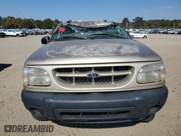 2000 Ford Explorer Sport with VIN 1FMYU60E3YUA95157, listed as a Copart auction lot 77214804 with 322,604 mi miles and Salvage title. Bid and sale history available at DreamBid. Image 5.