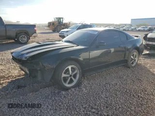 2003 Ford Mustang Premium Mach 1 with VIN 1FAFP42R13F394544, listed as a Copart auction lot 87125564 with 125,708 mi miles and Salvage title. Bid and sale history available at DreamBid. Image 1.