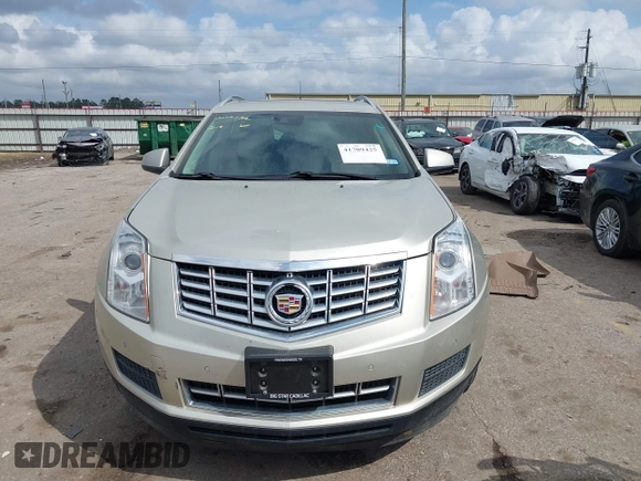 2014 Cadillac SRX Luxury Collection z VIN 3GYFNBE31ES628346, wystawiony jako IAAI lot #41709425 z przebiegiem 47 634 mil mil oraz . Historia ofert i sprzedaży dostępna na DreamBid. Obrazek 12.