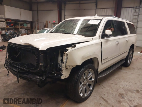 2015 GMC Yukon XL Denali with VIN 1GKS2JKJ1FR635901, listed as a IAAI auction lot 41805739 with 120,998 mi miles and . Bid and sale history available at carsss.com. Image 18.
