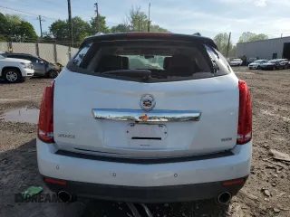2013 Cadillac SRX Luxury Collection z VIN 3GYFNCE36DS648807, wystawiony jako Copart lot #56410935 z przebiegiem 108 232 mil mil oraz Szkody całkowita. Historia ofert i sprzedaży dostępna na DreamBid. Obrazek 6.
