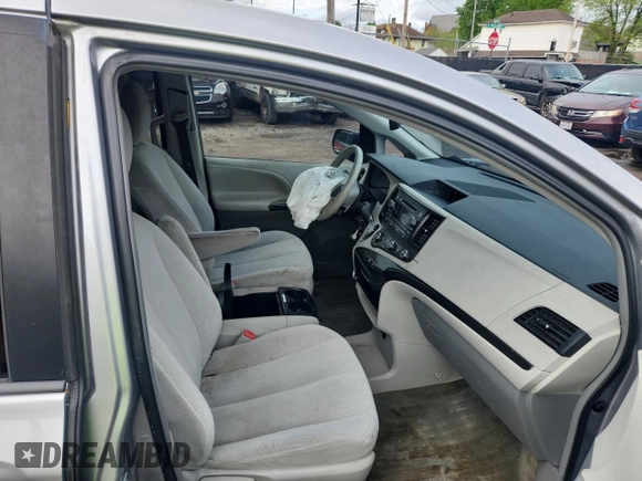 2012 Toyota Sienna LE AAS with VIN 5TDKK3DC4CS244048, listed as a Copart auction lot 55940585 with 163,222 mi miles and Clean Title. Bid and sale history available at DreamBid. Image 5.