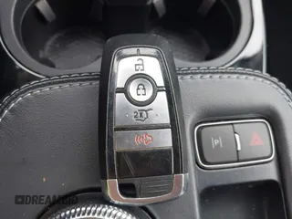 2021 Ford Mustang Mach-E Select with VIN 3FMTK1SS4MMA21329, listed as a IAAI auction lot 42241810 with 35,700 mi miles and . Bid and sale history available at DreamBid. Image 11.