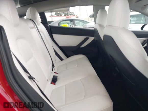 2021 Tesla Model 3 Long Range with VIN 5YJ3E1EB3MF862392, listed as a IAAI auction lot 41765987 with 51,915 mi miles and . Bid and sale history available at DreamBid. Image 8.