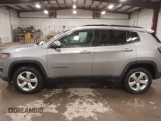 2020 Jeep Compass Latitude with VIN 3C4NJDBB1LT155169, listed as a IAAI auction lot 41486112 with 42,857 mi miles and . Bid and sale history available at DreamBid. Image 14.