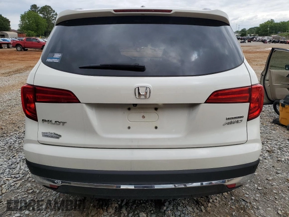2017 Honda Pilot Touring z VIN 5FNYF6H92HB067140, wystawiony jako Copart lot #55757925 z przebiegiem 132 425 mil mil oraz Szkoda całkowita • Salvage title. Historia ofert i sprzedaży dostępna na DreamBid. Obrazek 6.