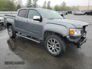 2022 GMC Canyon 4WD Denali with VIN 1GTG6EEN0N1147922, listed as a Copart auction lot 54143435 with 68,650 mi miles and Salvage title. Bid and sale history available at DreamBid. Image 4.