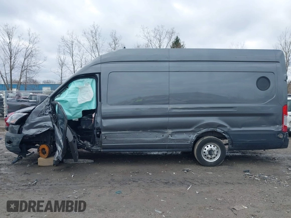 2023 Ford Transit Cargo z VIN 1FTBW3X86PKC01923, wystawiony jako IAAI lot #41886513 z przebiegiem 148 658 mil mil oraz . Historia ofert i sprzedaży dostępna na DreamBid. Obrazek 14.