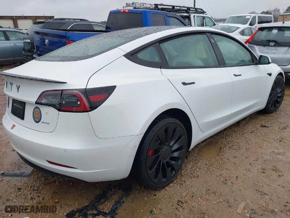 2021 Tesla Model 3 Performance with VIN 5YJ3E1EC3MF995632, listed as a IAAI auction lot 41548478 with 43,585 mi miles. Bid and sale history available at carsss.com. Image 4.