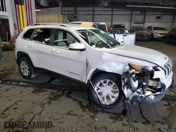 2017 Jeep Cherokee Latitude with VIN 1C4PJMCS7HW555326, listed as a Copart auction lot 87687345 with 89,717 mi miles and Salvage title. Bid and sale history available at DreamBid. Image 4.