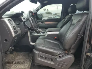 2014 Ford F-150 SVT Raptor with VIN 1FTFW1R60EFA82287, listed as a Copart auction lot 52150635 with 157,556 mi miles and Salvage Title. Bid and sale history available at carsss.com. Image 7.