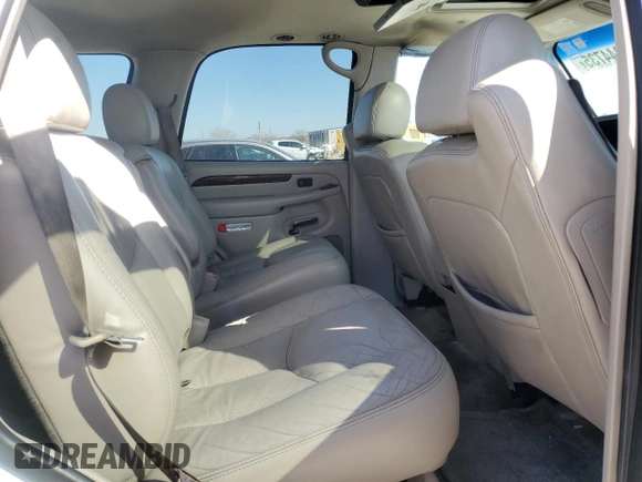 2003 Cadillac Escalade с VIN 1GYEC63T63R290034, выставлен на аукционе Copart как лот 46844735 с пробегом 304 433 миль миль и Чистый • Clean title. История ставок и продаж доступна на DreamBid. Изображение 11.