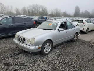 1999 Mercedes-Benz E-Class with VIN WDBJF65H0XA773509, listed as a Copart auction lot 88336875 with 416,203 mi miles and Salvage Title. Bid and sale history available at carsss.com. Image 1.