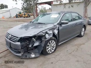 2012 Volkswagen Passat S with VIN 1VWAH7A31CC087907, listed as a IAAI auction lot 42083574 with 185,591 mi miles and . Bid and sale history available at DreamBid. Image 2.