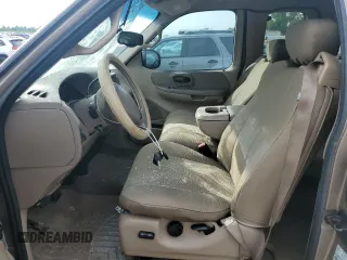 2002 Ford F-150 XL with VIN 1FTRX17L02KC02580, listed as a Copart auction lot 60859595 with 175,892 mi miles and Salvage title. Bid and sale history available at DreamBid. Image 7.