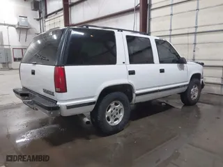 1996 Chevrolet Tahoe with VIN 1GNEK13R5TJ341299, listed as a IAAI auction lot 41713489 with 251,990 mi miles. Bid and sale history available at carsss.com. Image 4.