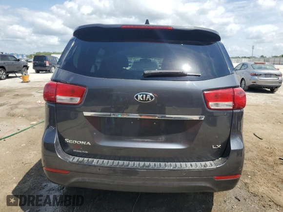 2015 Kia Sedona LX with VIN KNDMB5C1XF6021148, listed as a Copart auction lot 54574715 with 196,086 mi miles and Salvage Title. Bid and sale history available at DreamBid. Image 6.